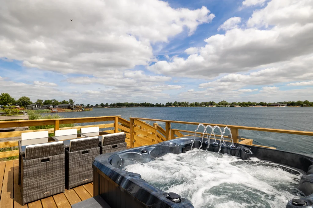 The hot tub and outdoor kitchen on the decking