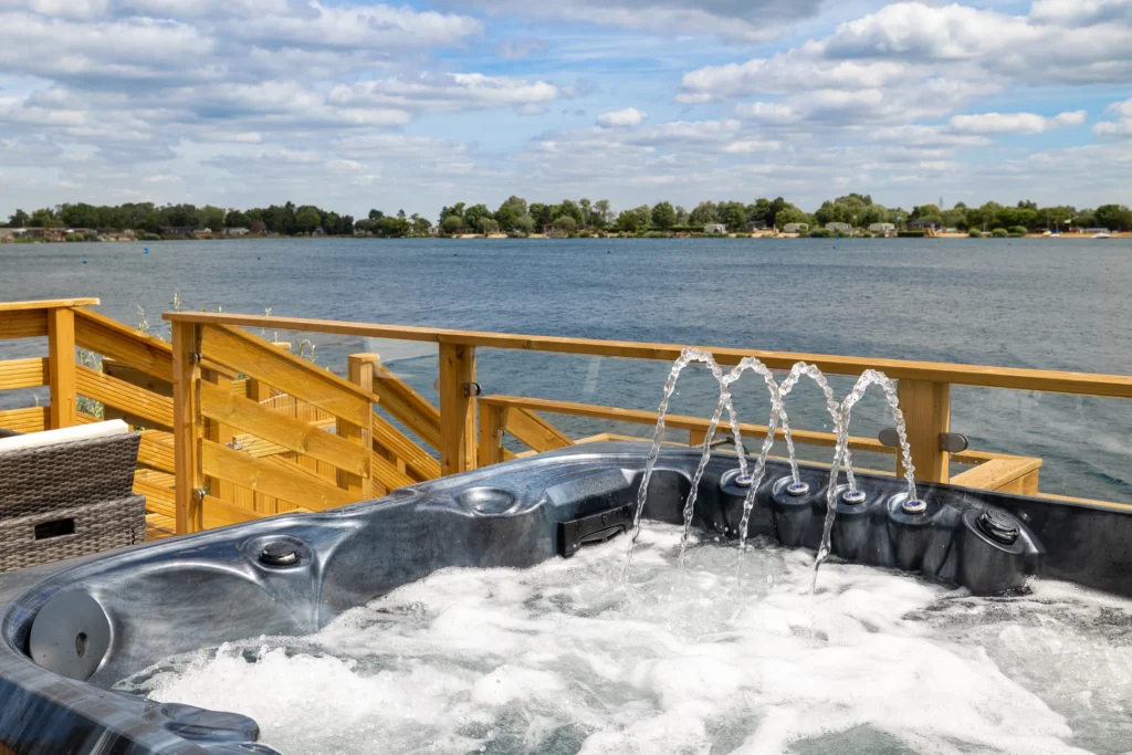 The hot tub overlooking the lake