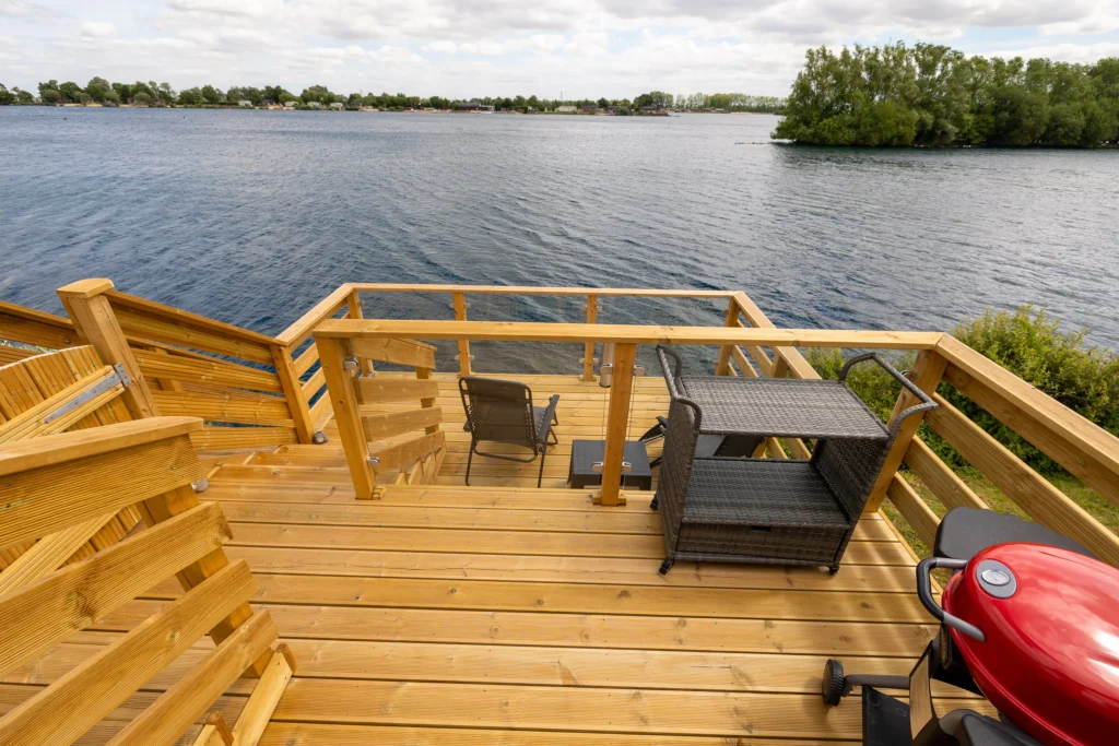 Decking with seating beside the lake
