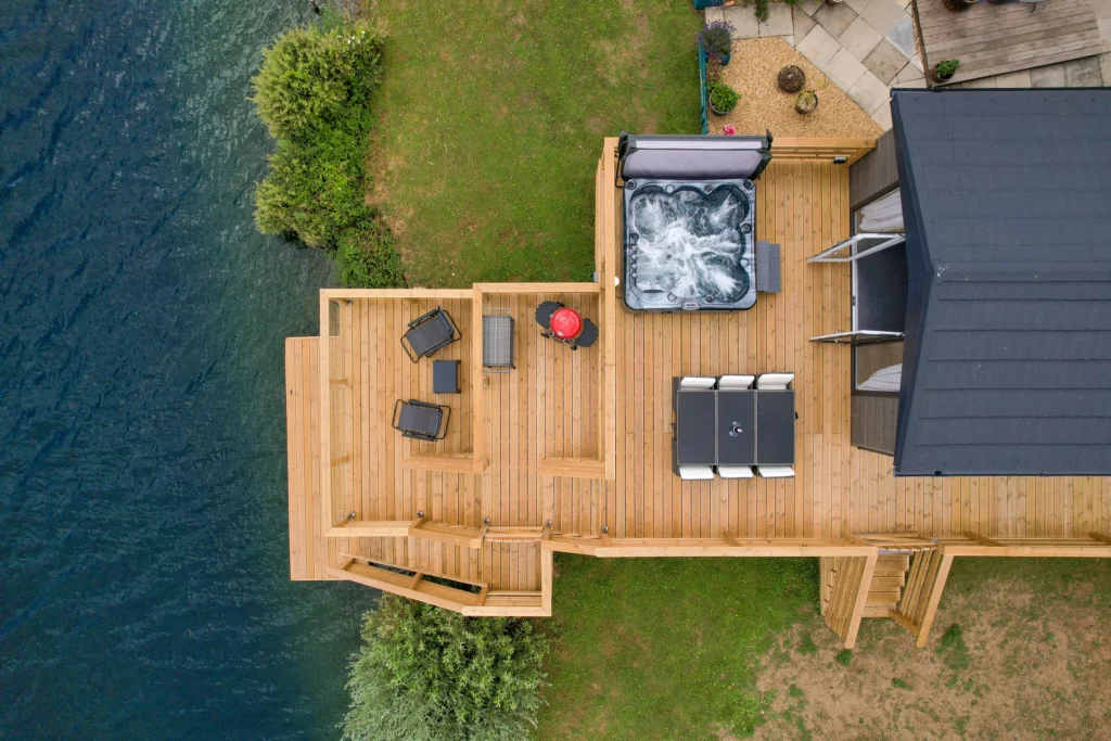 Overhead view of the lodge, decking and hot tub